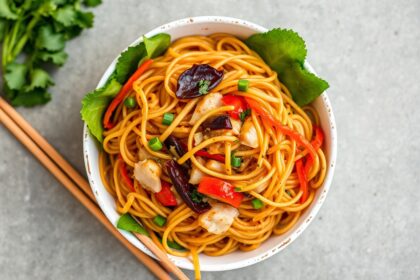 Colorful veggie stir fry noodles for easy meal prep.