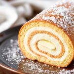 Unbelievably soft flourless vanilla Swiss roll, gluten-free perfection.